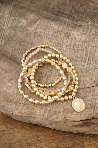 Boho Bracelet Stack with a Coin in worn gold tone